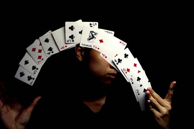 magician doing a card trick