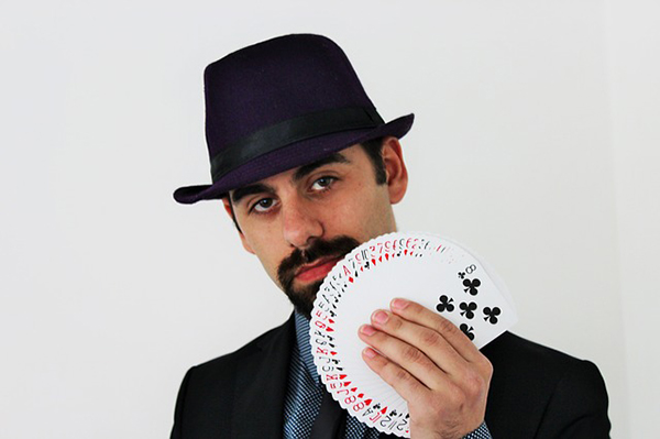 man holding cards